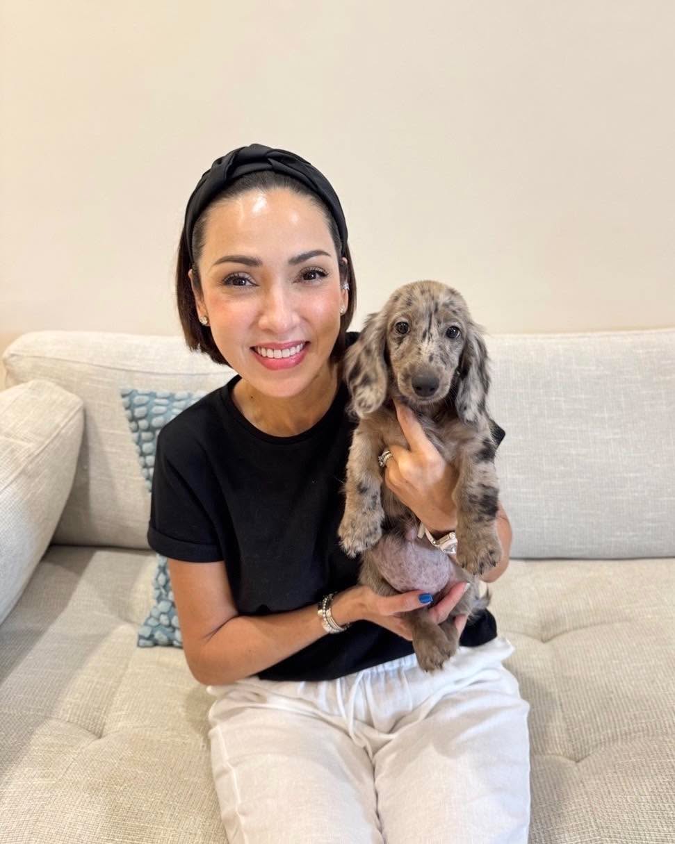 Olivia Bennett with their Prestige Doxies dachshund