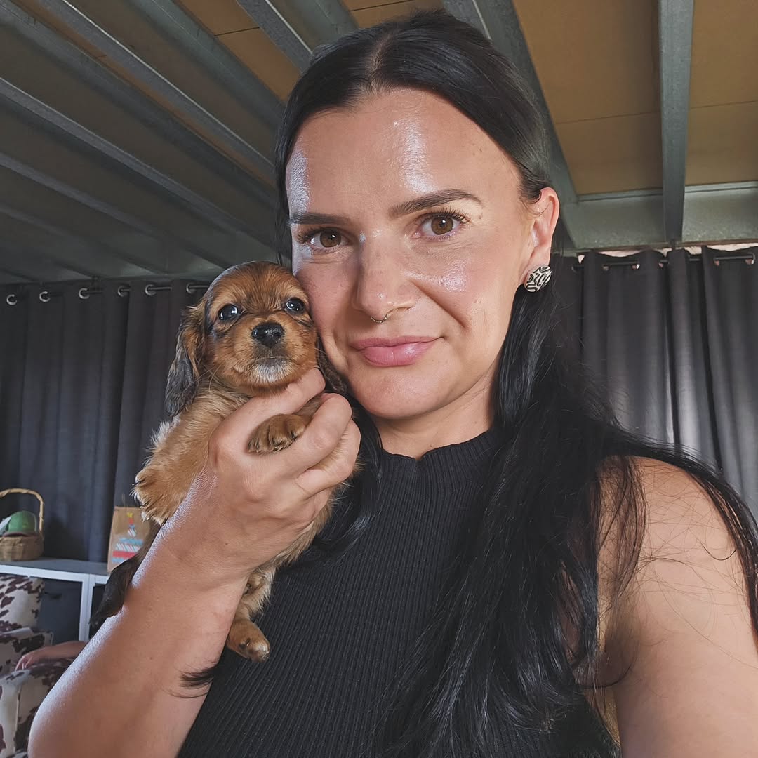 Amanda Lee with their Prestige Doxies dachshund